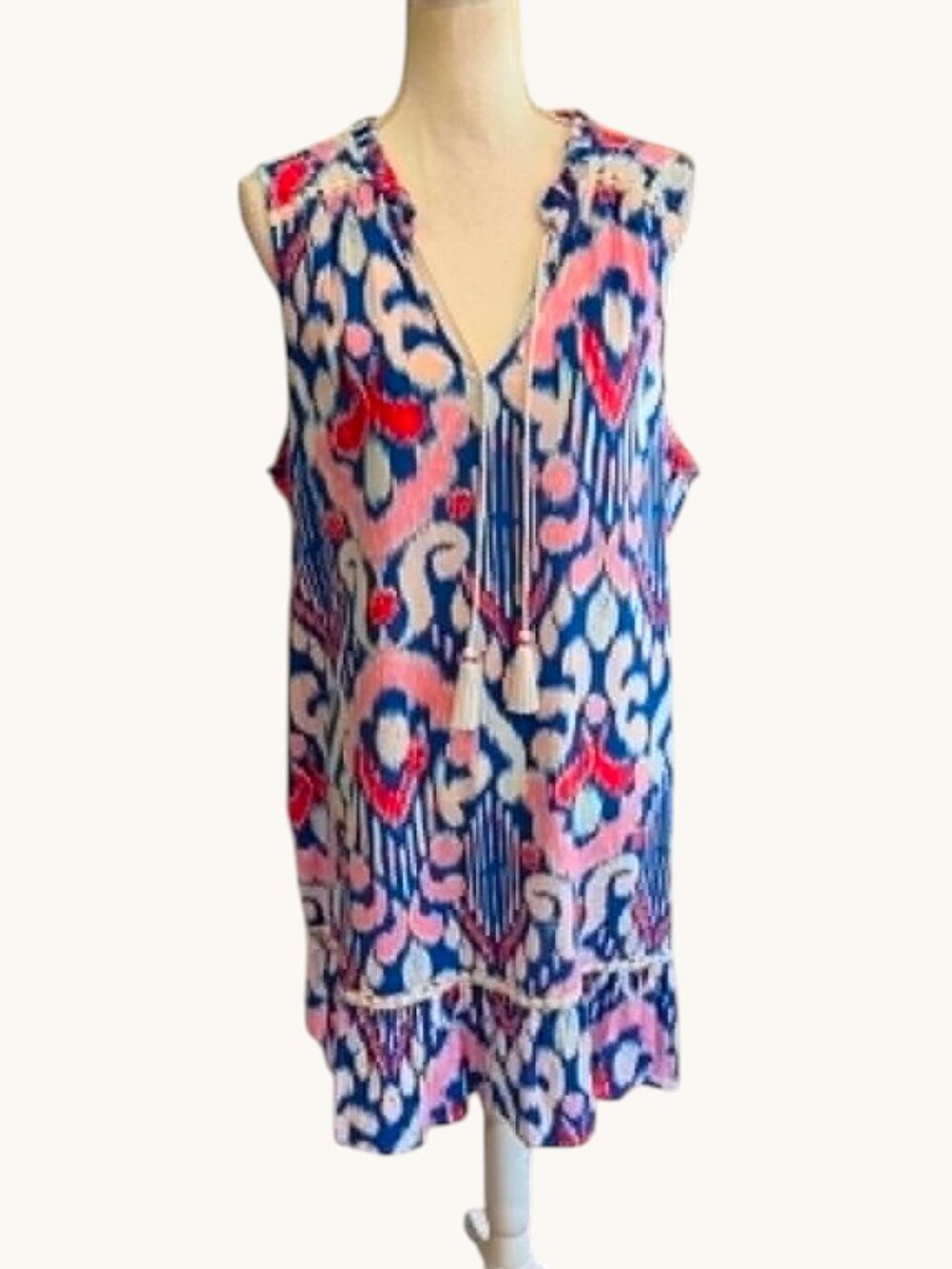Crown & Ivy Sleeveless Dress featuring a blue, white, and red ikat print